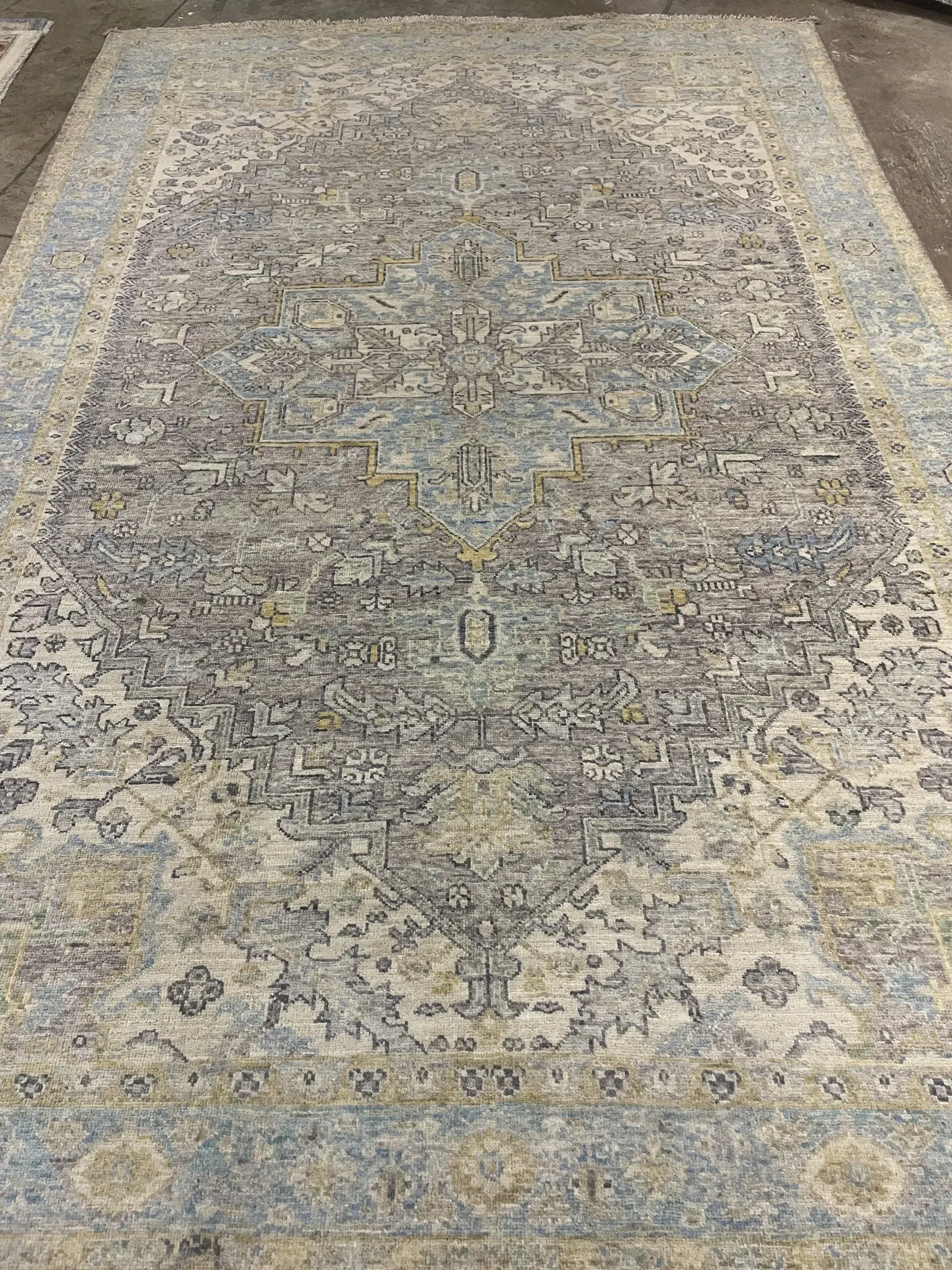 A rug with a detailed pattern on it.