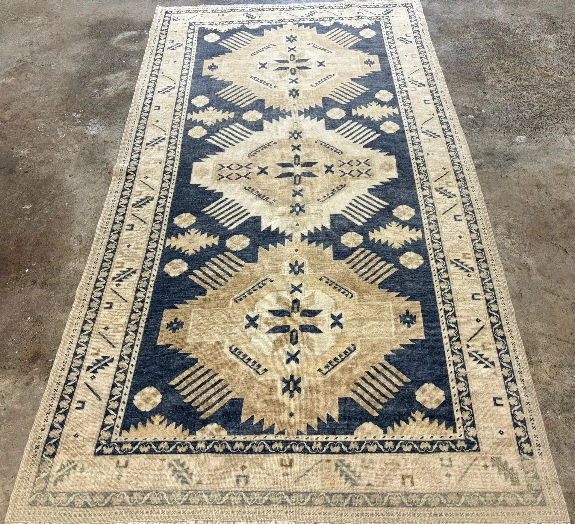 A rug with a detailed pattern on it.