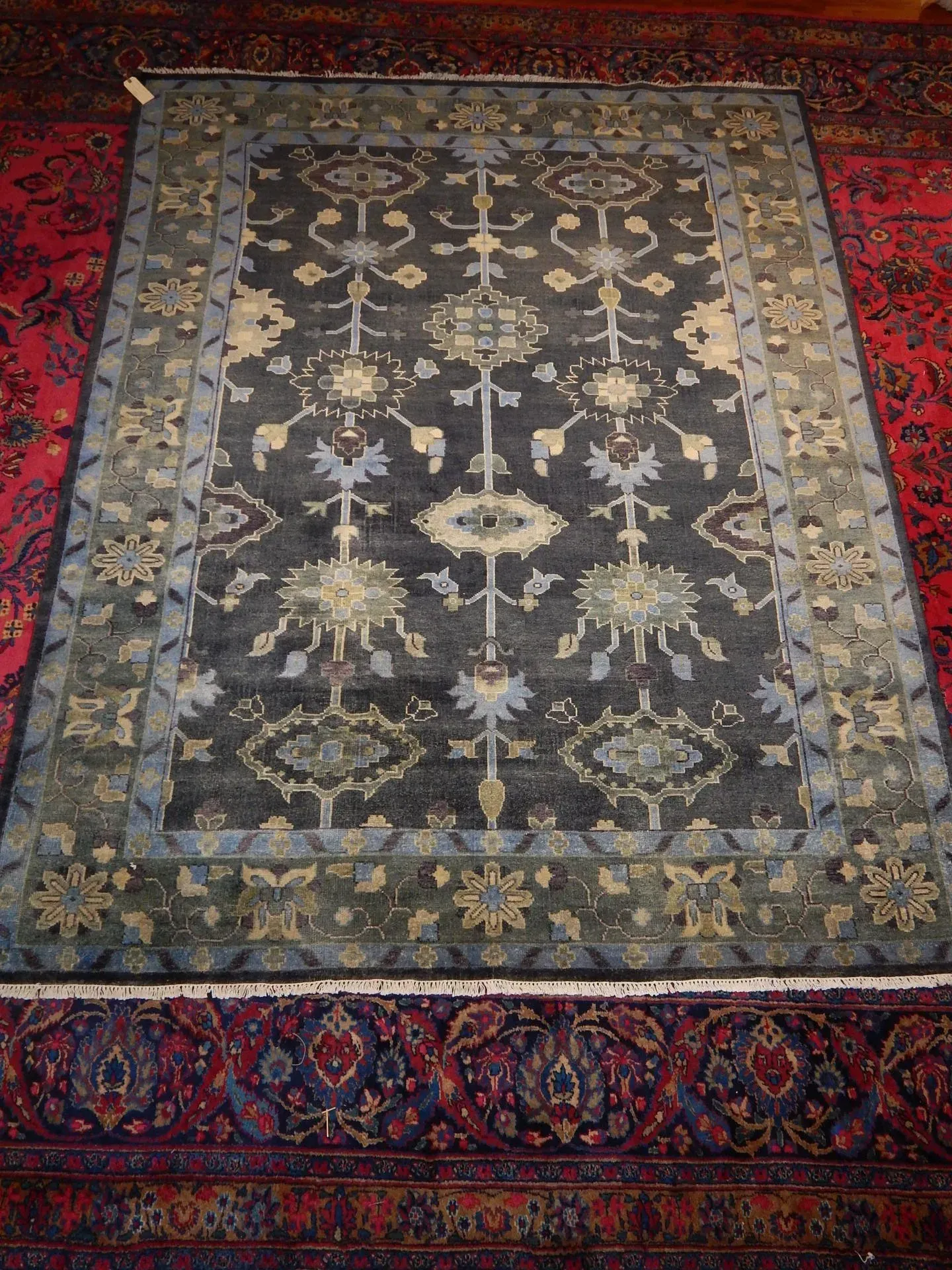 A rug with a detailed pattern on it.