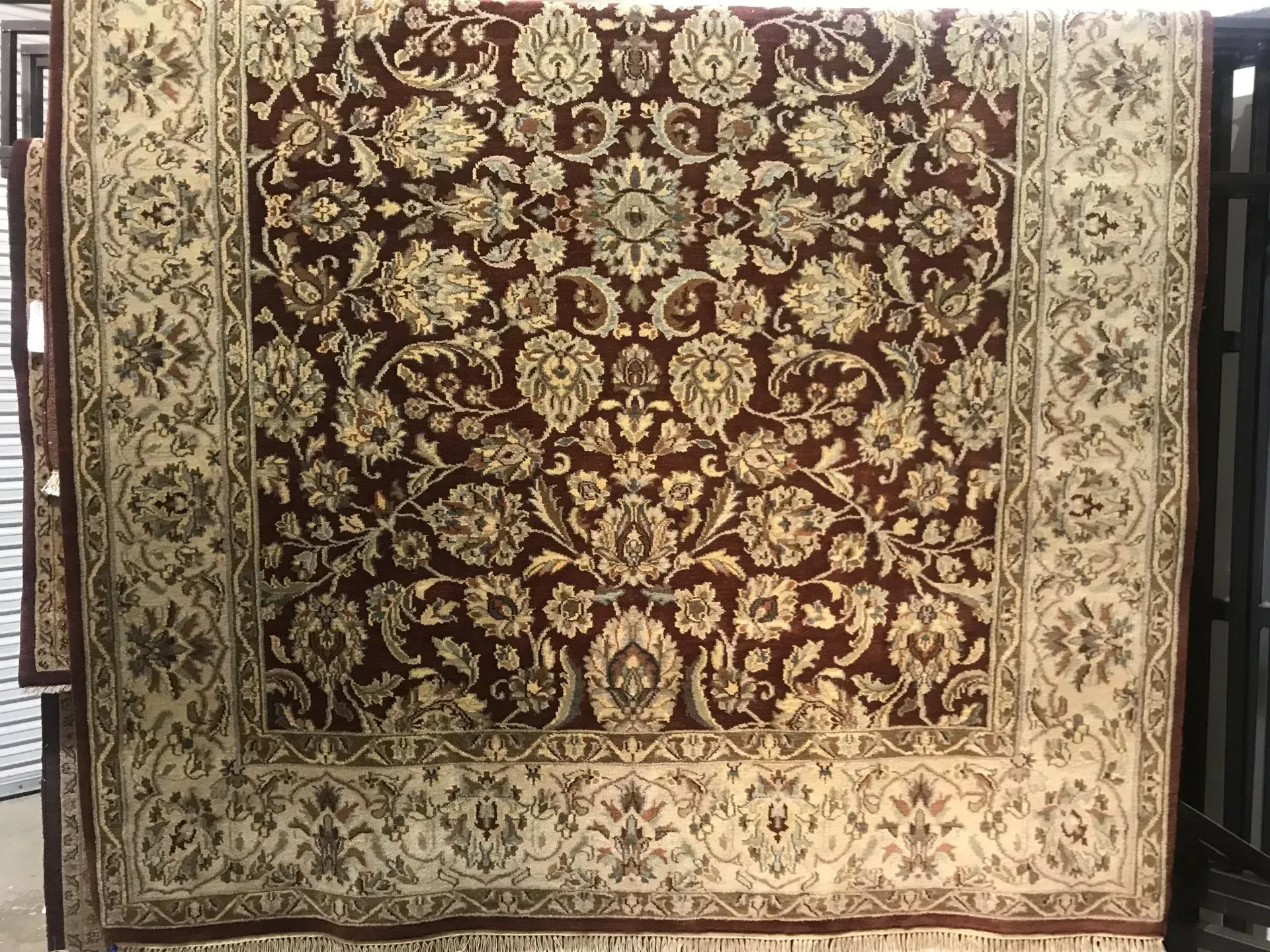A rug with a detailed pattern on it.