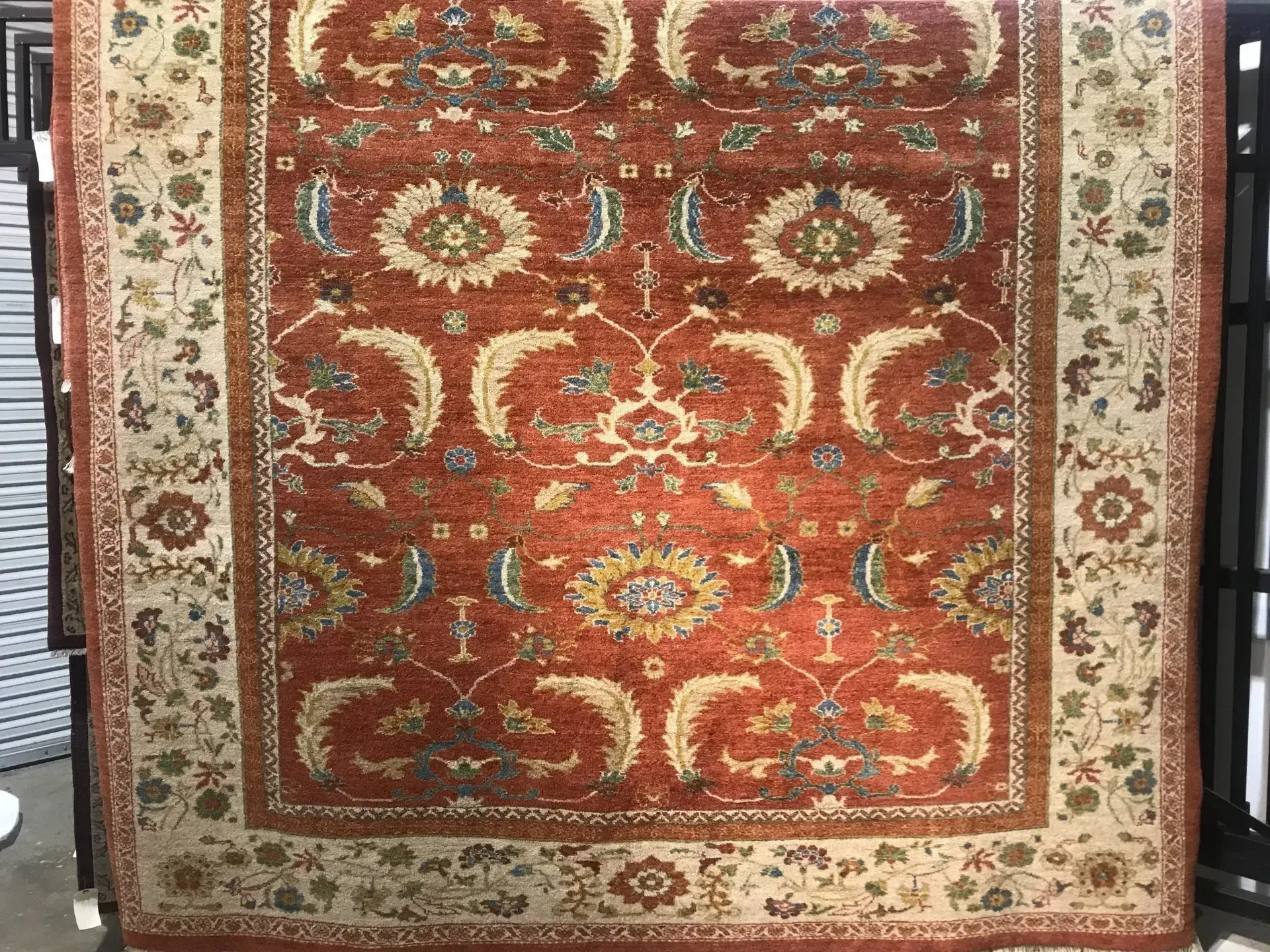 A rug with a detailed pattern on it.