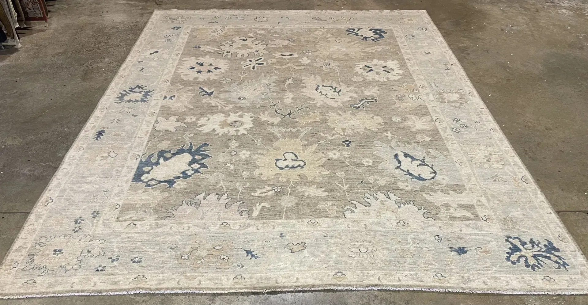 A rug with a detailed pattern on it.