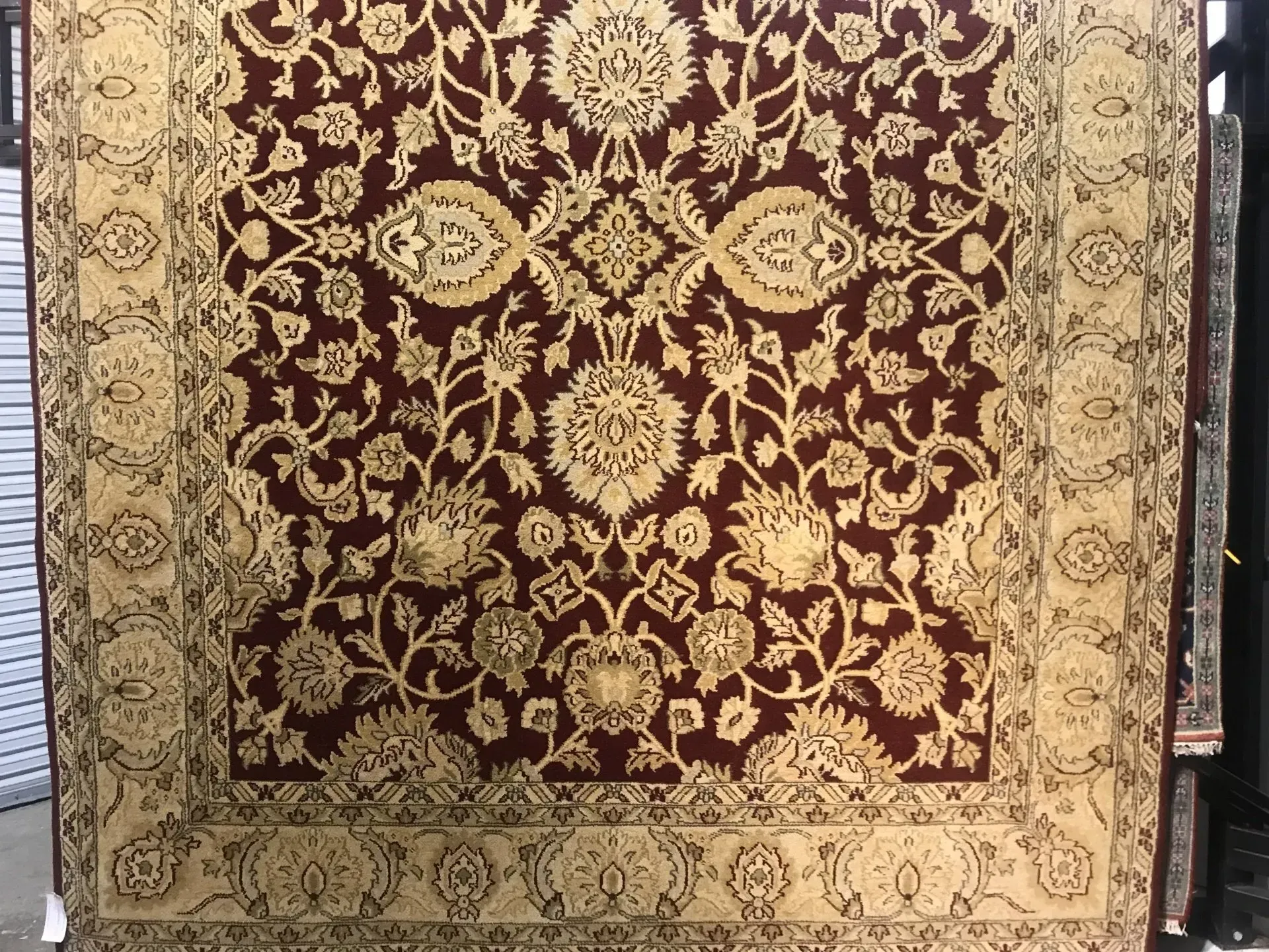 A rug with a detailed pattern on it.