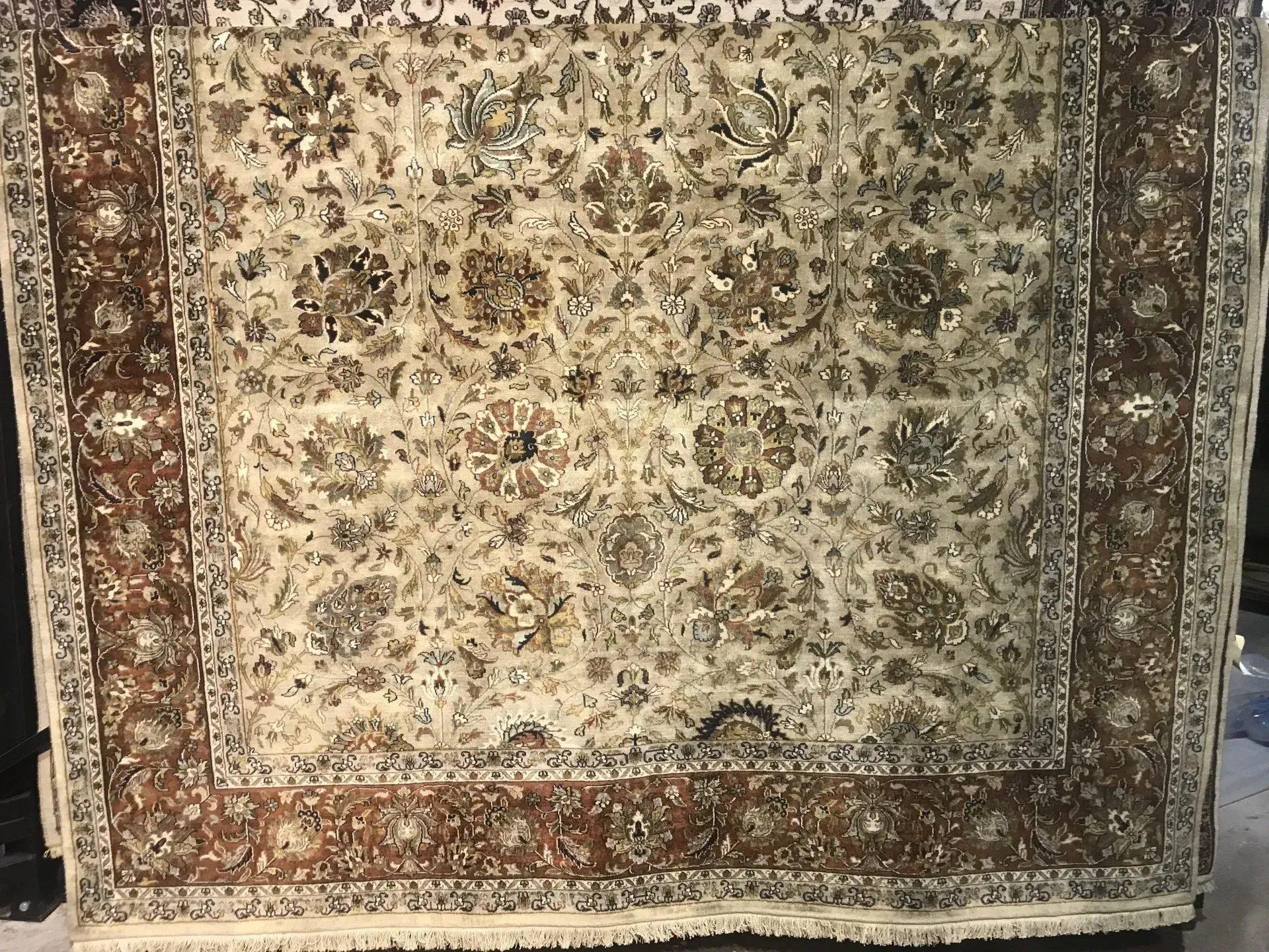 A rug with a detailed pattern on it.