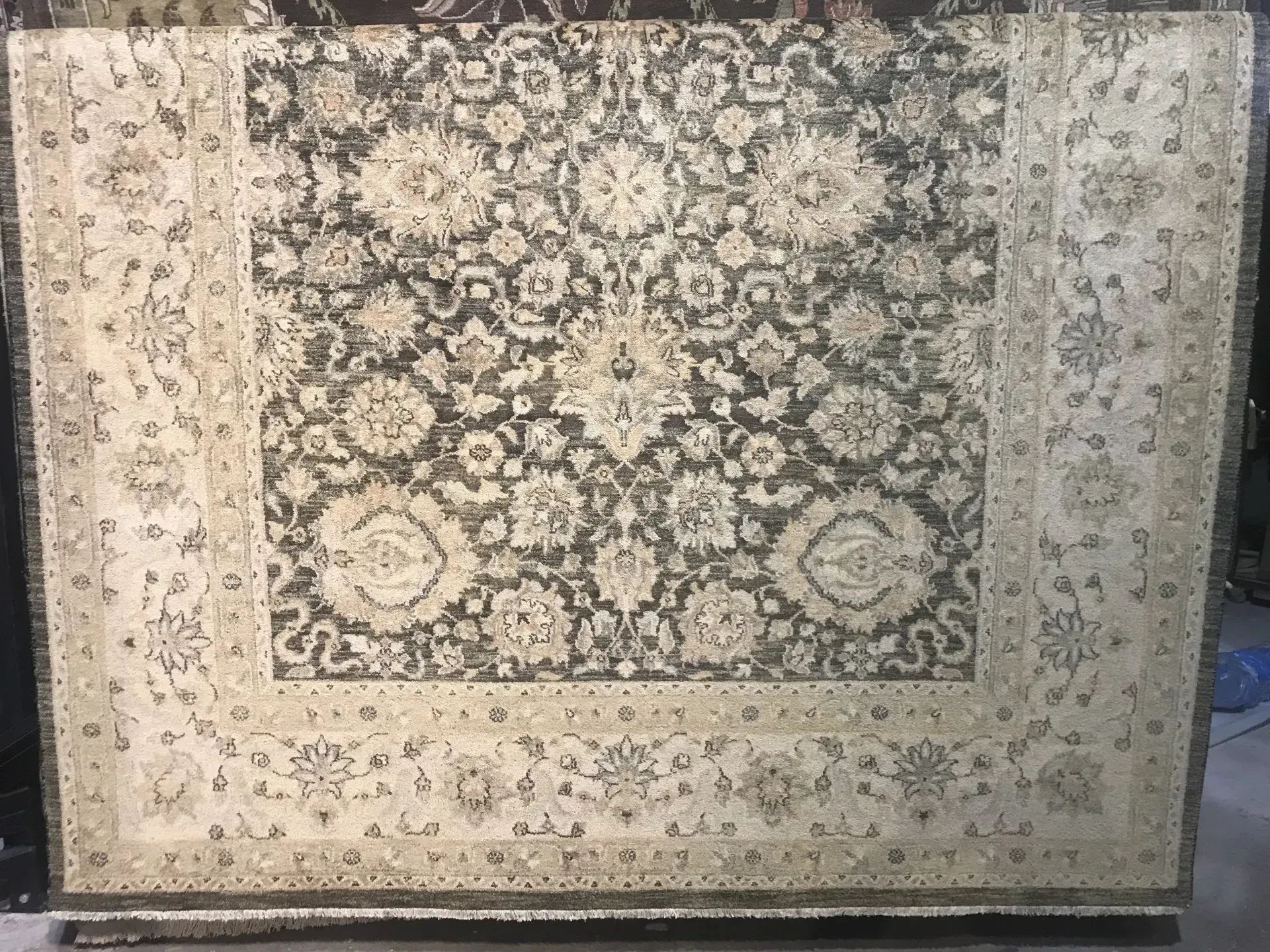 A rug with a detailed pattern on it.