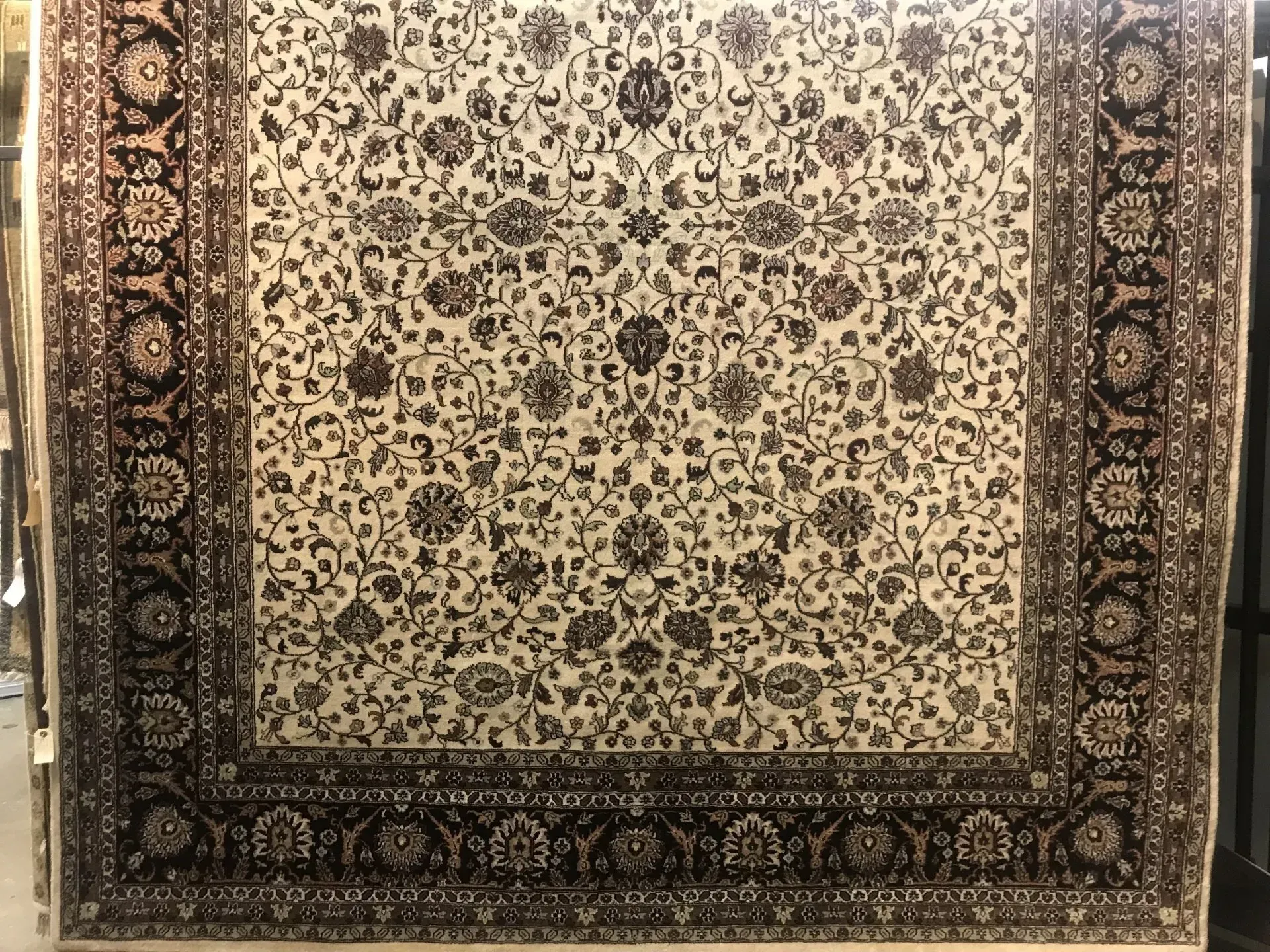 A rug with a detailed pattern on it.