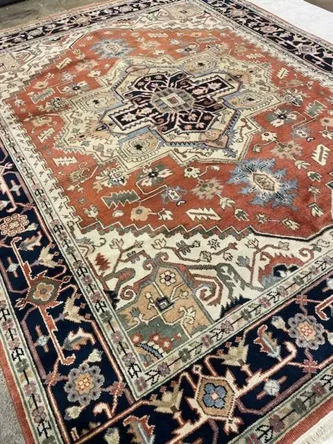 A rug with a detailed pattern on it.