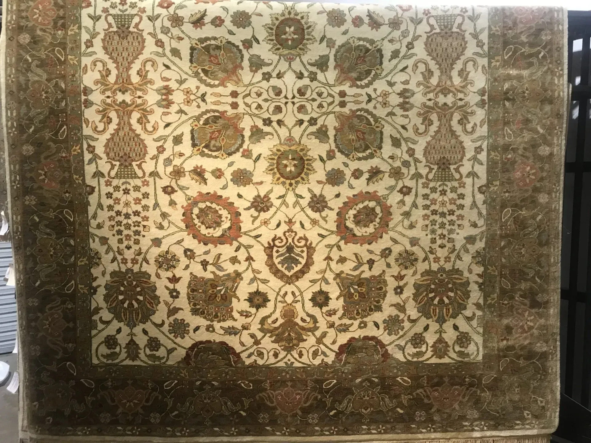 A rug with a detailed pattern on it.