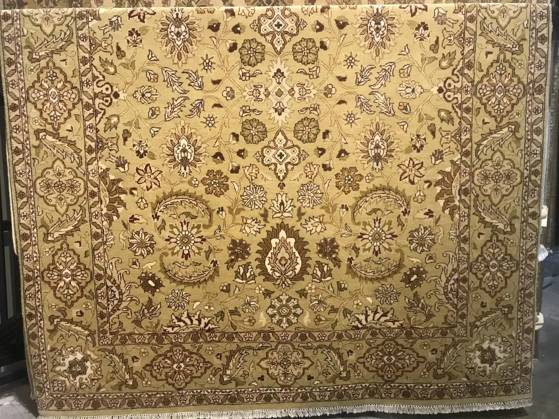 A rug with a detailed pattern on it.