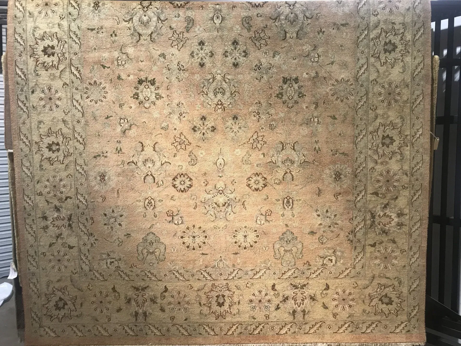 A rug with a detailed pattern on it.