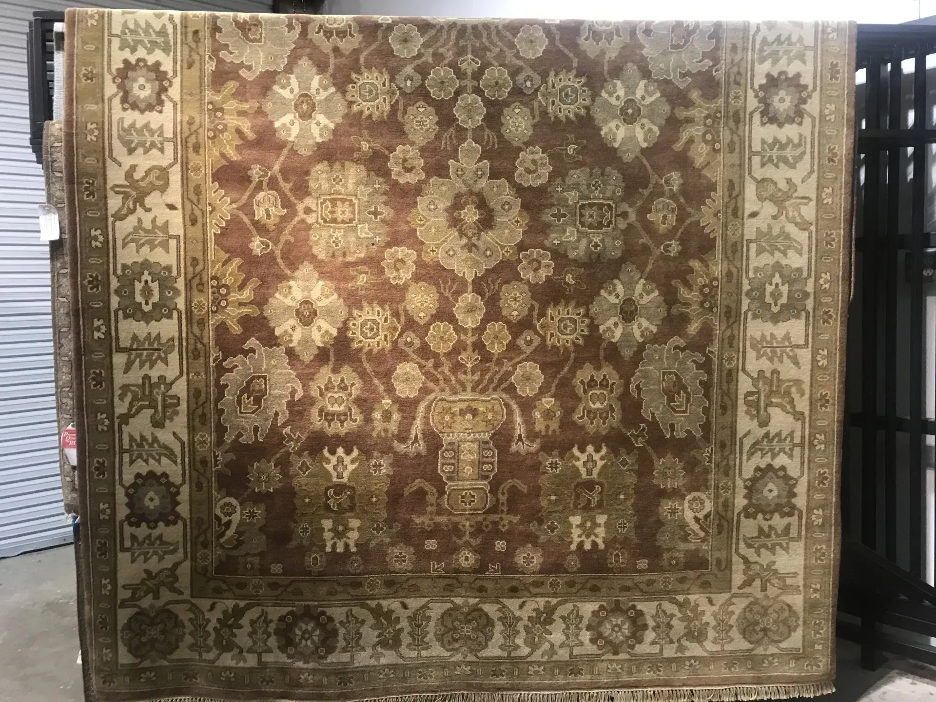 A rug with a detailed pattern on it.