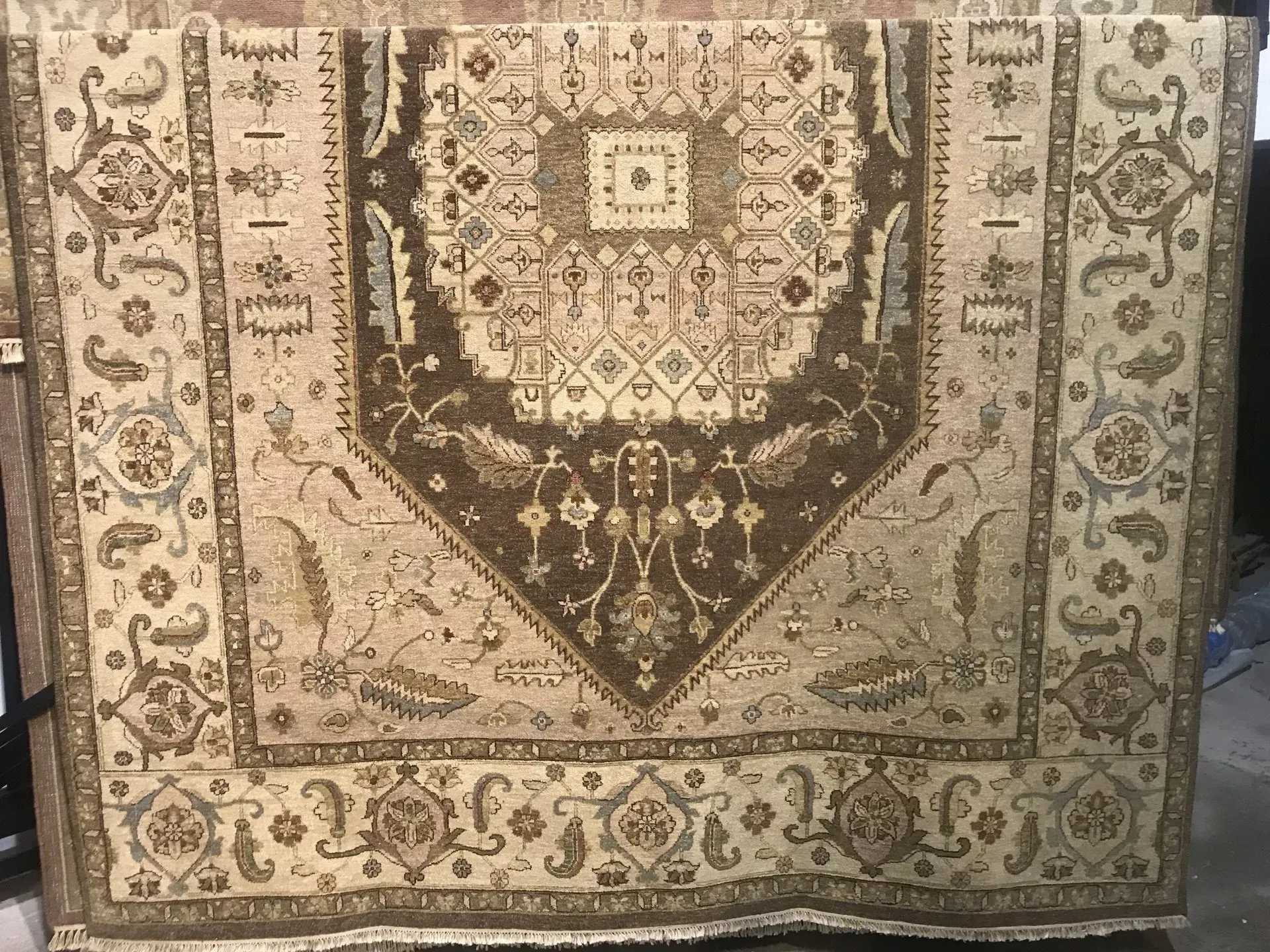 A rug with a detailed pattern on it.