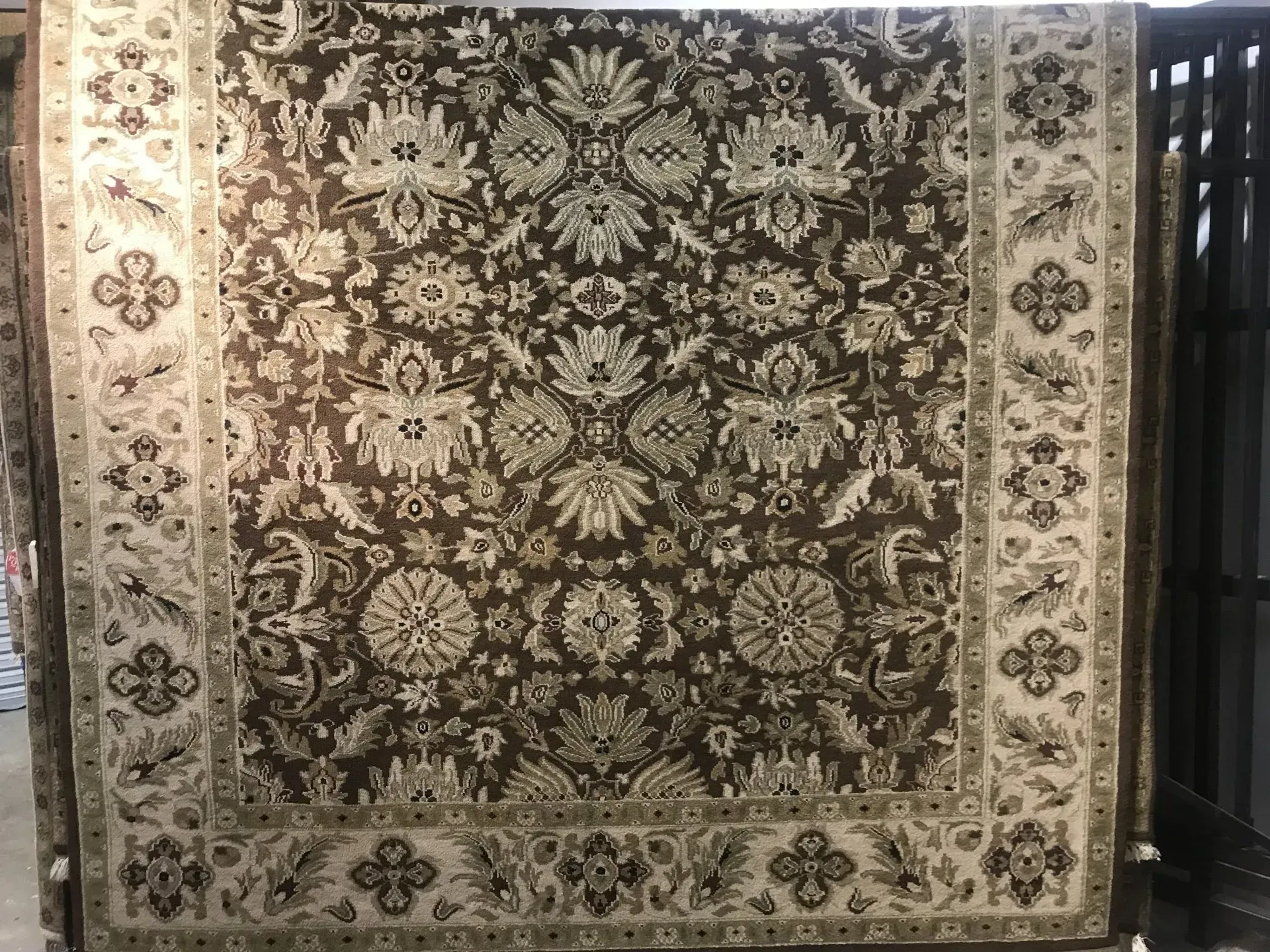 A rug with a detailed pattern on it.