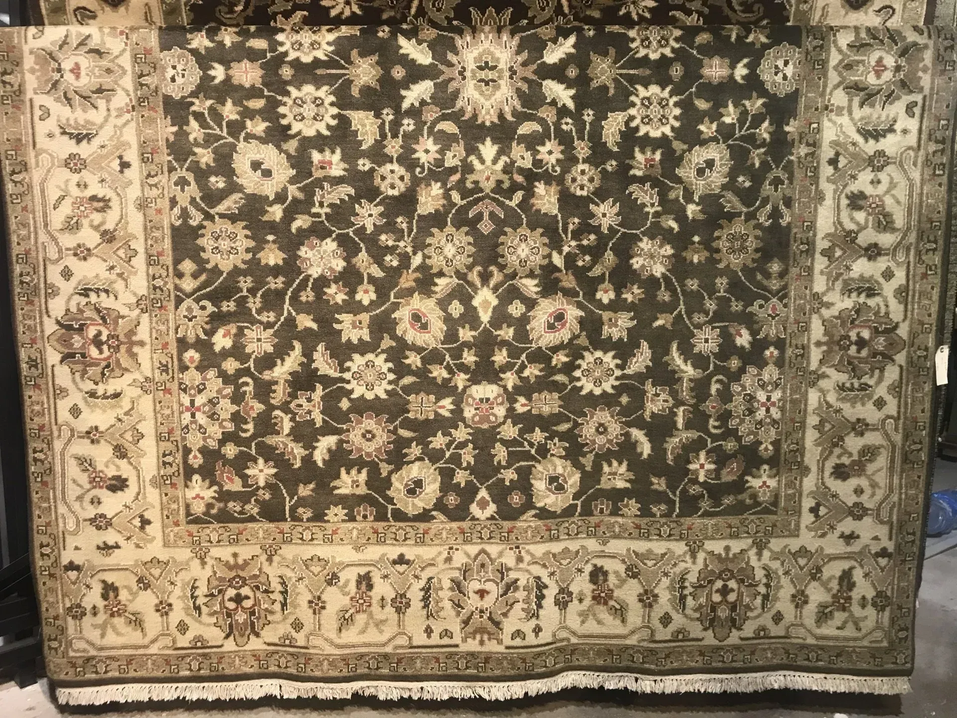 A rug with a detailed pattern on it.
