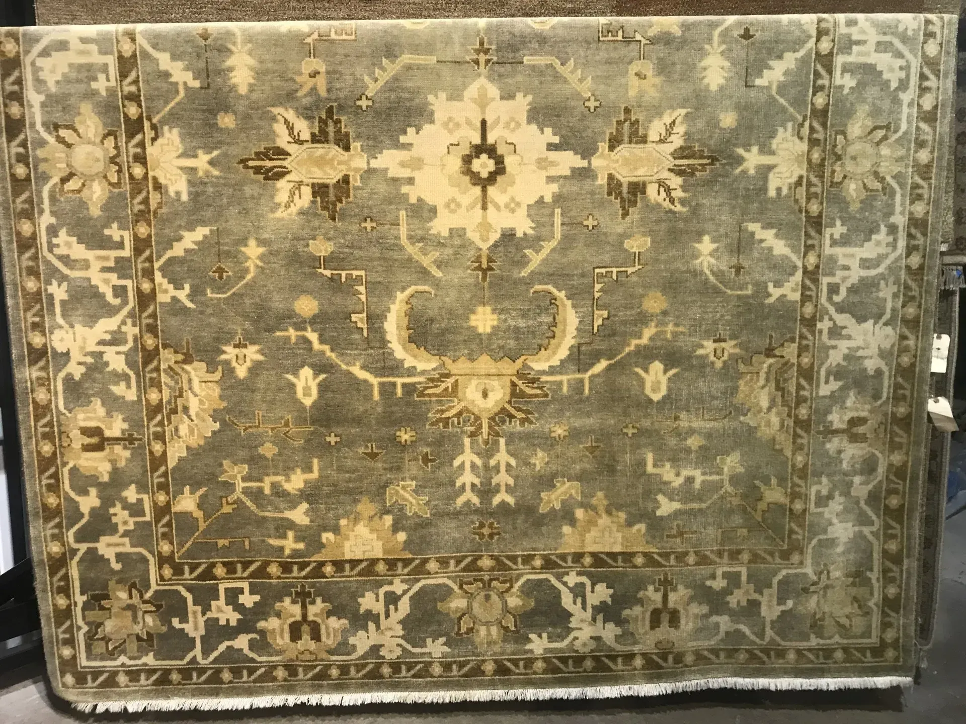A rug with a detailed pattern on it.