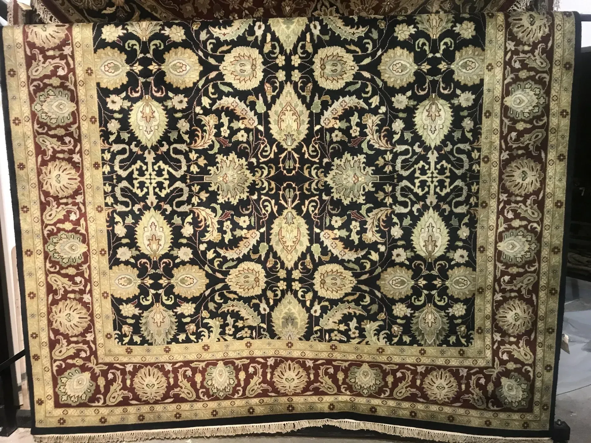 A rug with a detailed pattern on it.