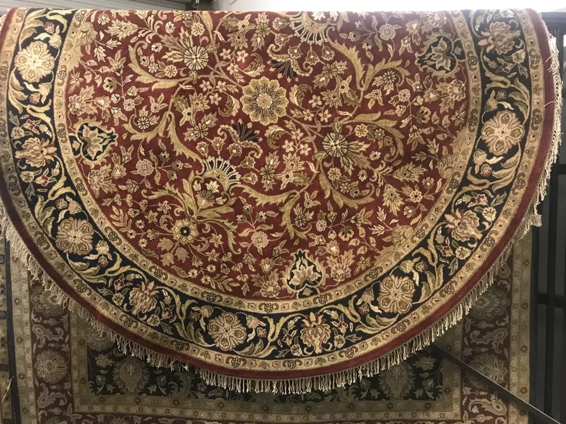 A rug with a detailed pattern on it.