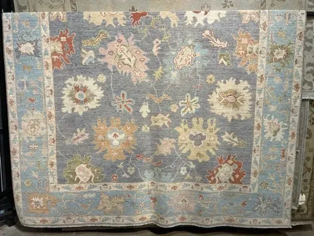 A rug with a detailed pattern on it.