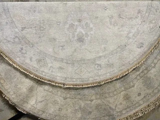 A rug with a detailed pattern on it.