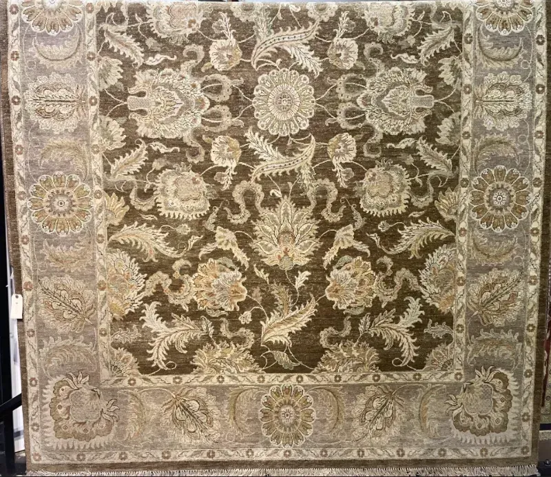 A rug with a detailed pattern on it.