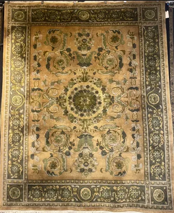 A rug with a detailed pattern on it.