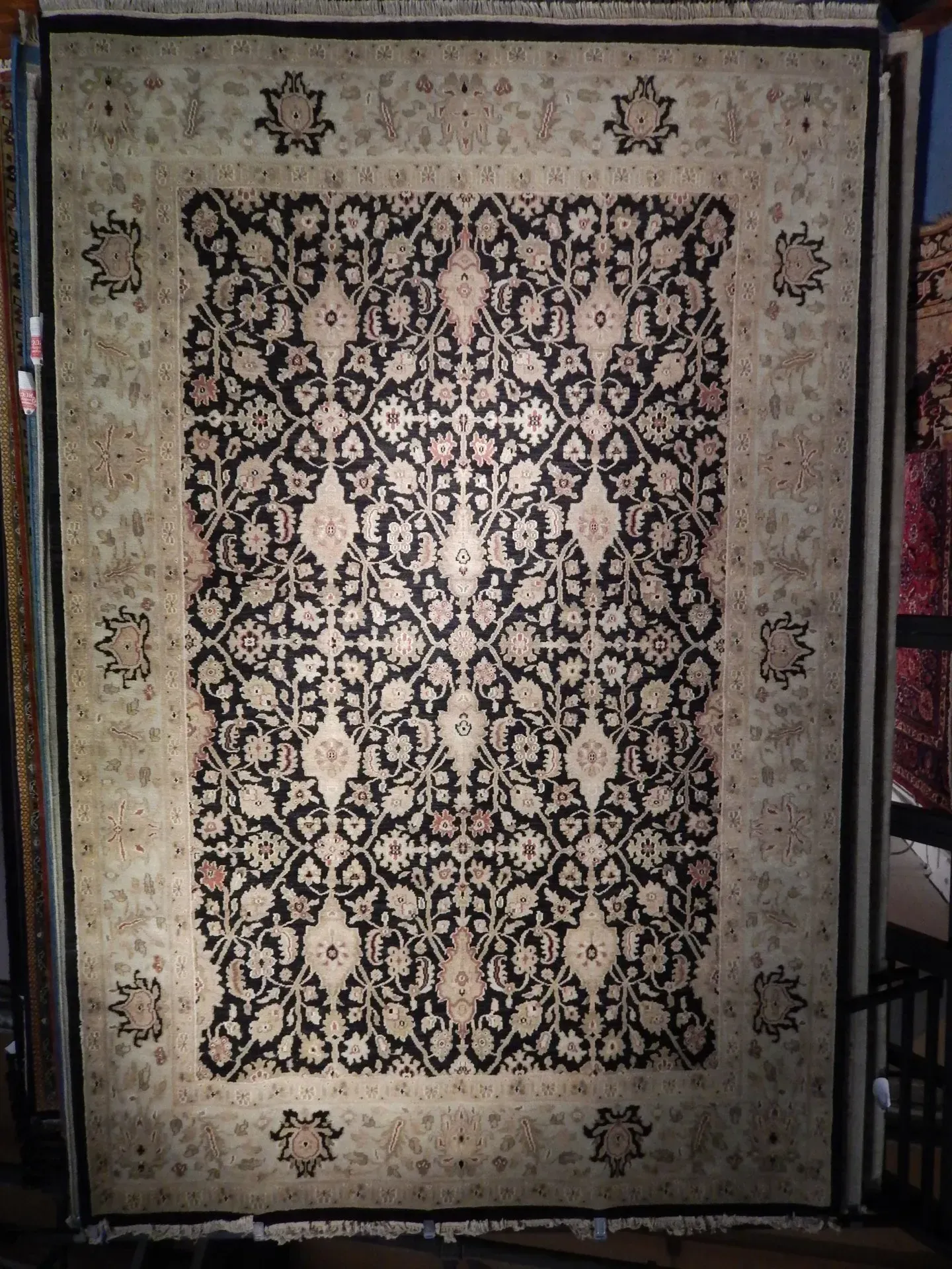 A rug with a detailed pattern on it.