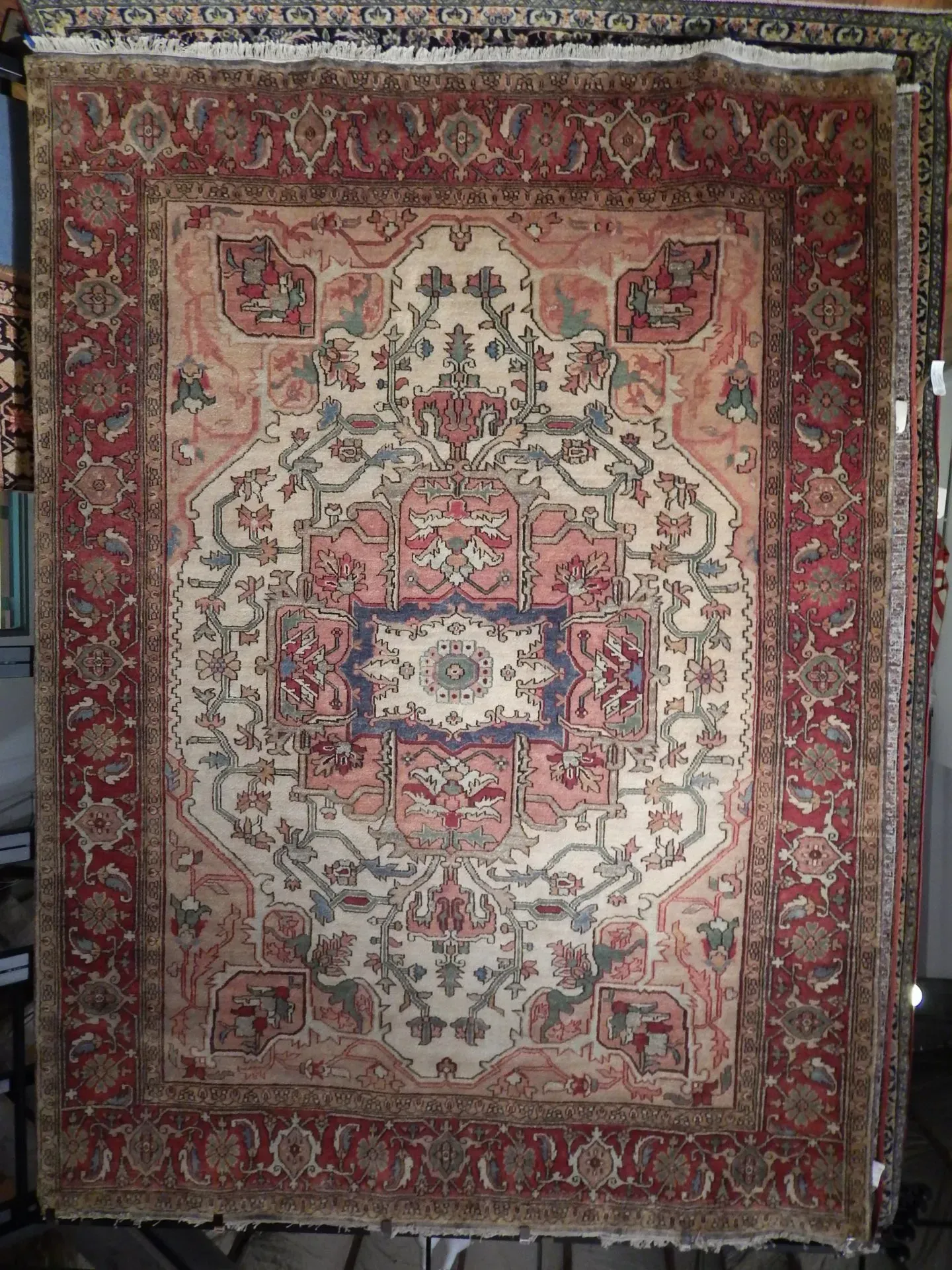 A rug with a detailed pattern on it.
