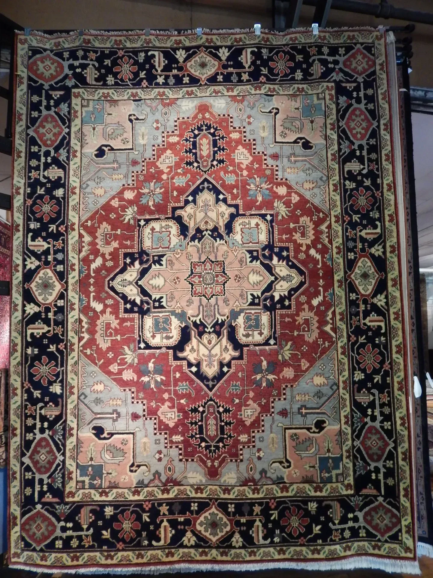 A rug with a detailed pattern on it.