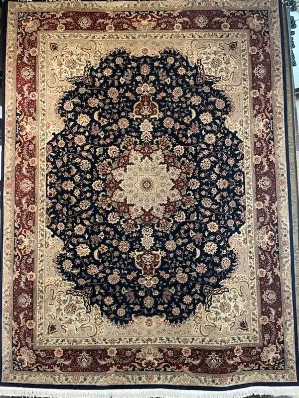 A rug with a detailed pattern on it.