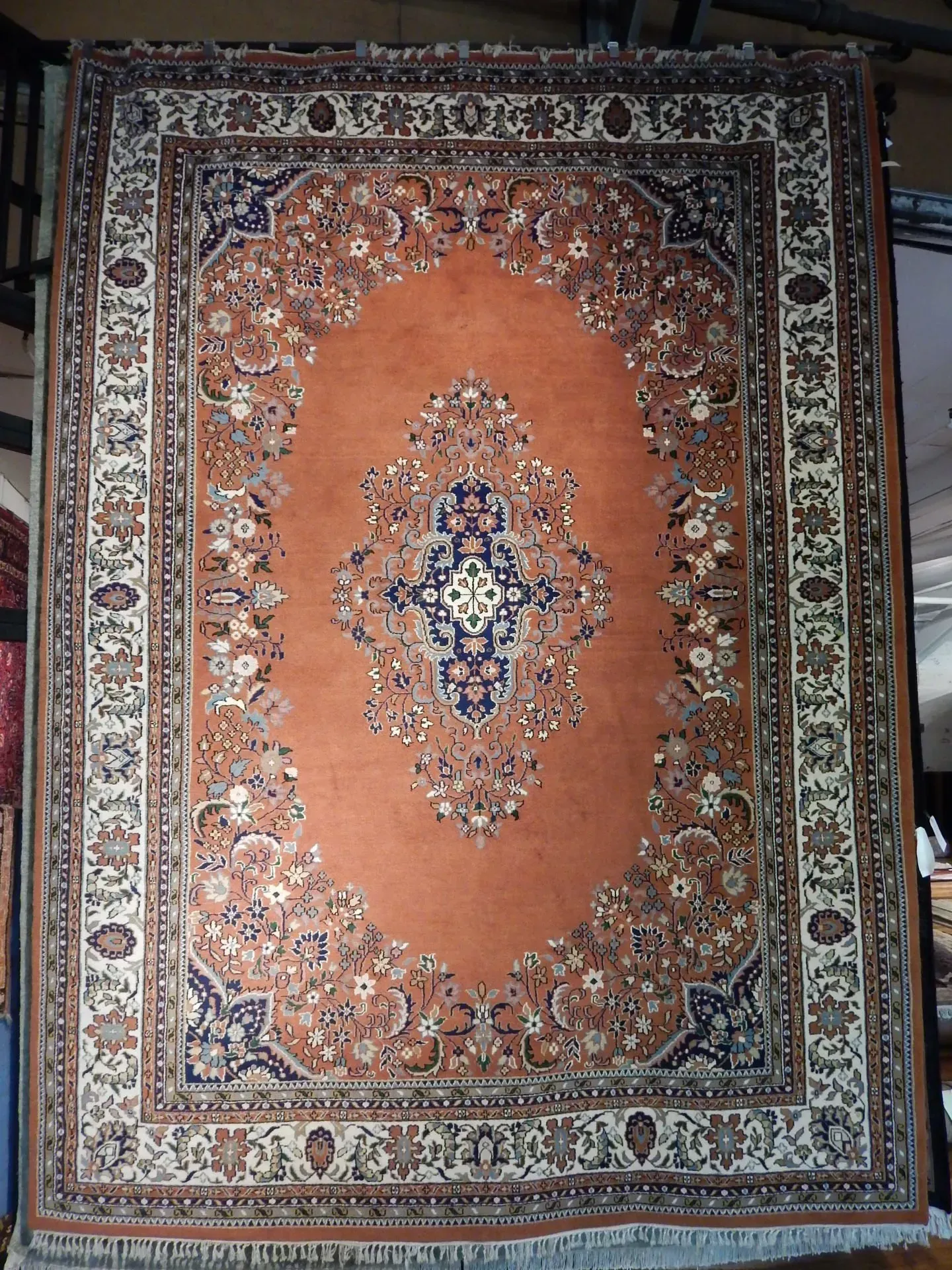 A rug with a detailed pattern on it.