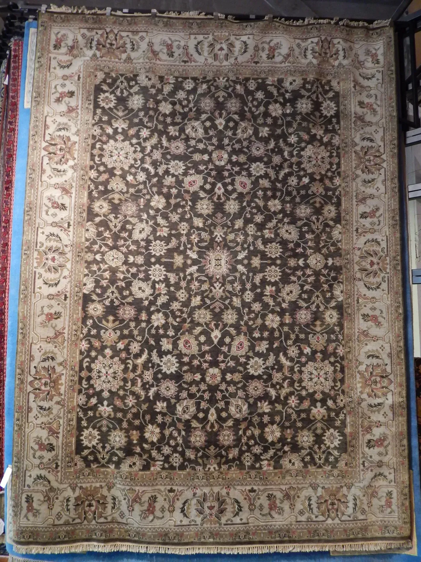 A rug with a detailed pattern on it.