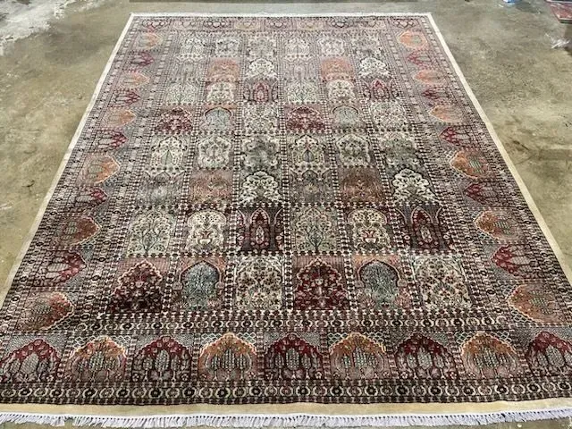 A rug with a detailed pattern on it.