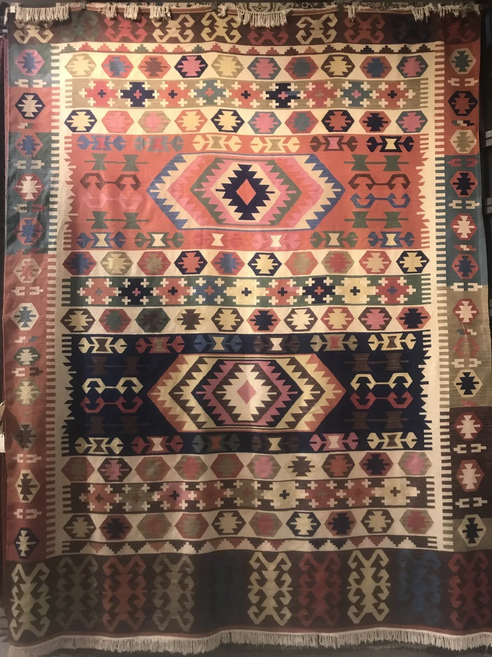 A rug with a detailed pattern on it.