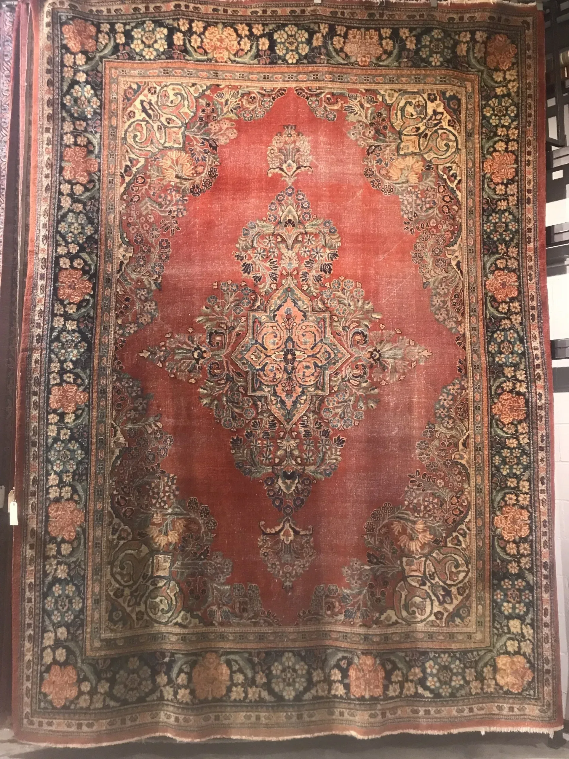 A rug with a detailed pattern on it.