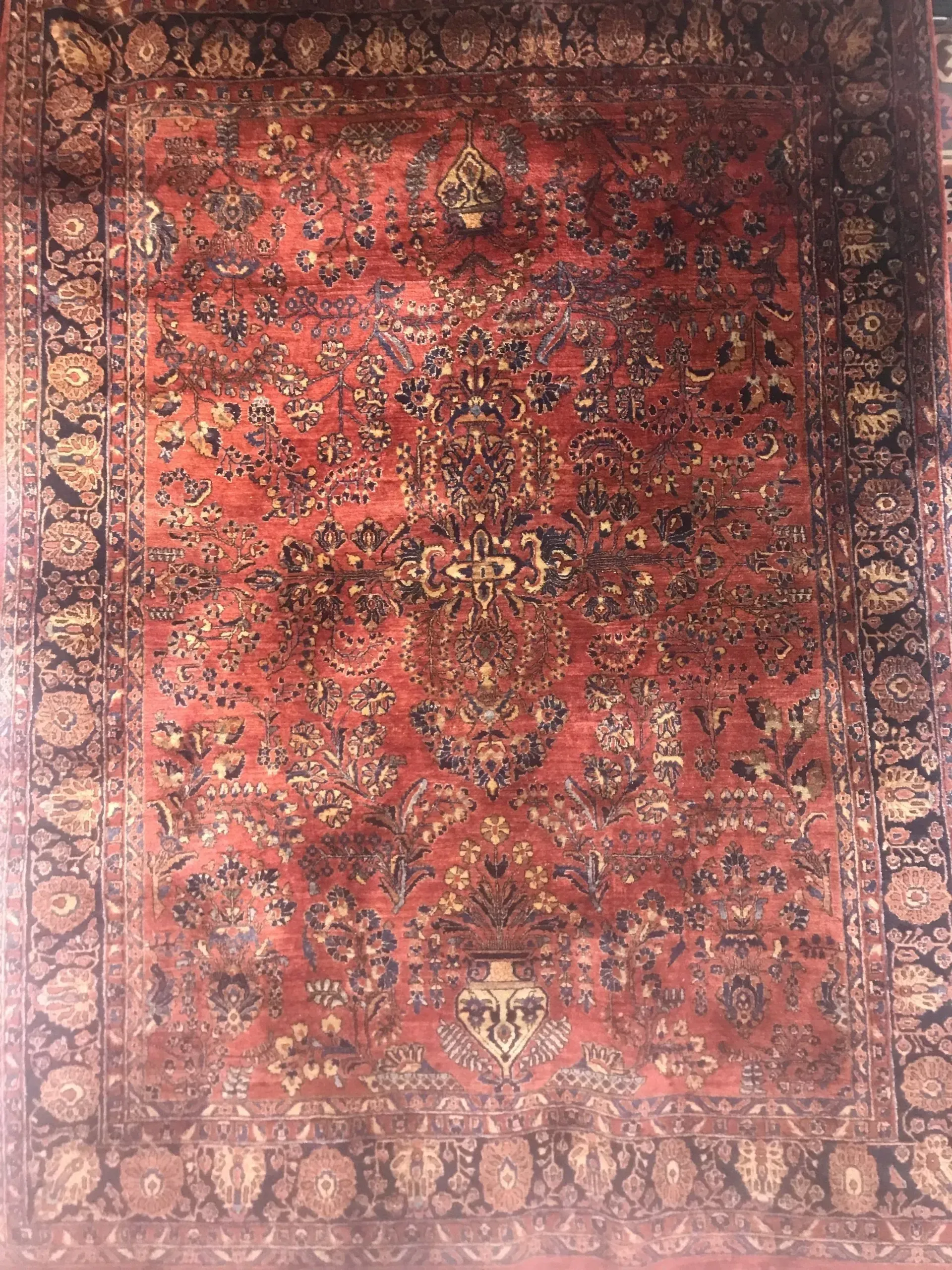 A rug with a detailed pattern on it.