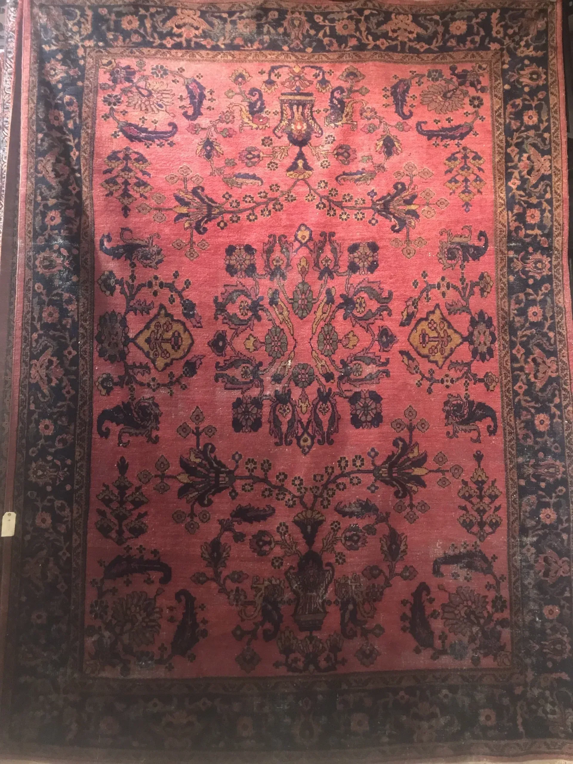 A rug with a detailed pattern on it.