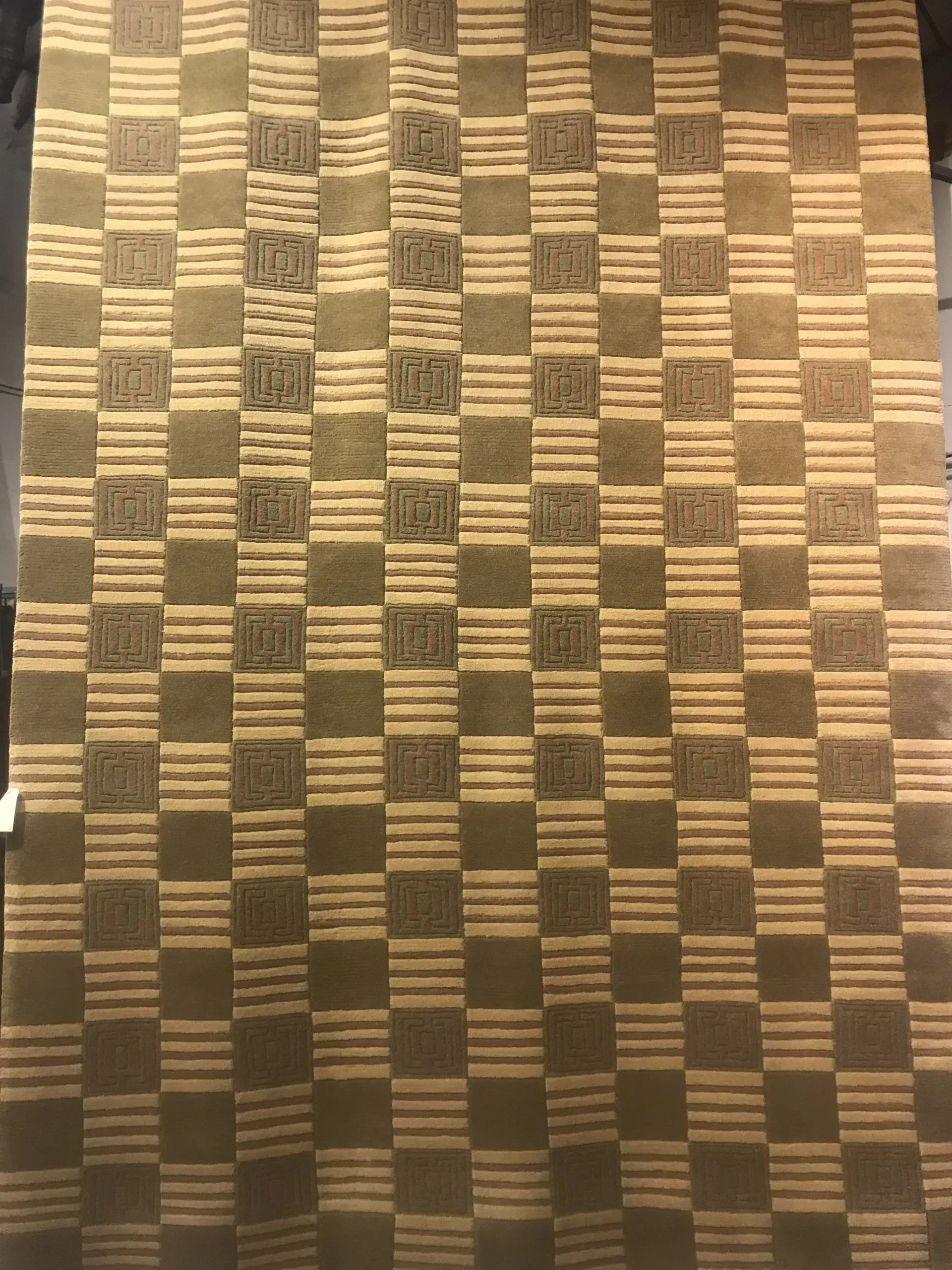 A rug with a detailed pattern on it.