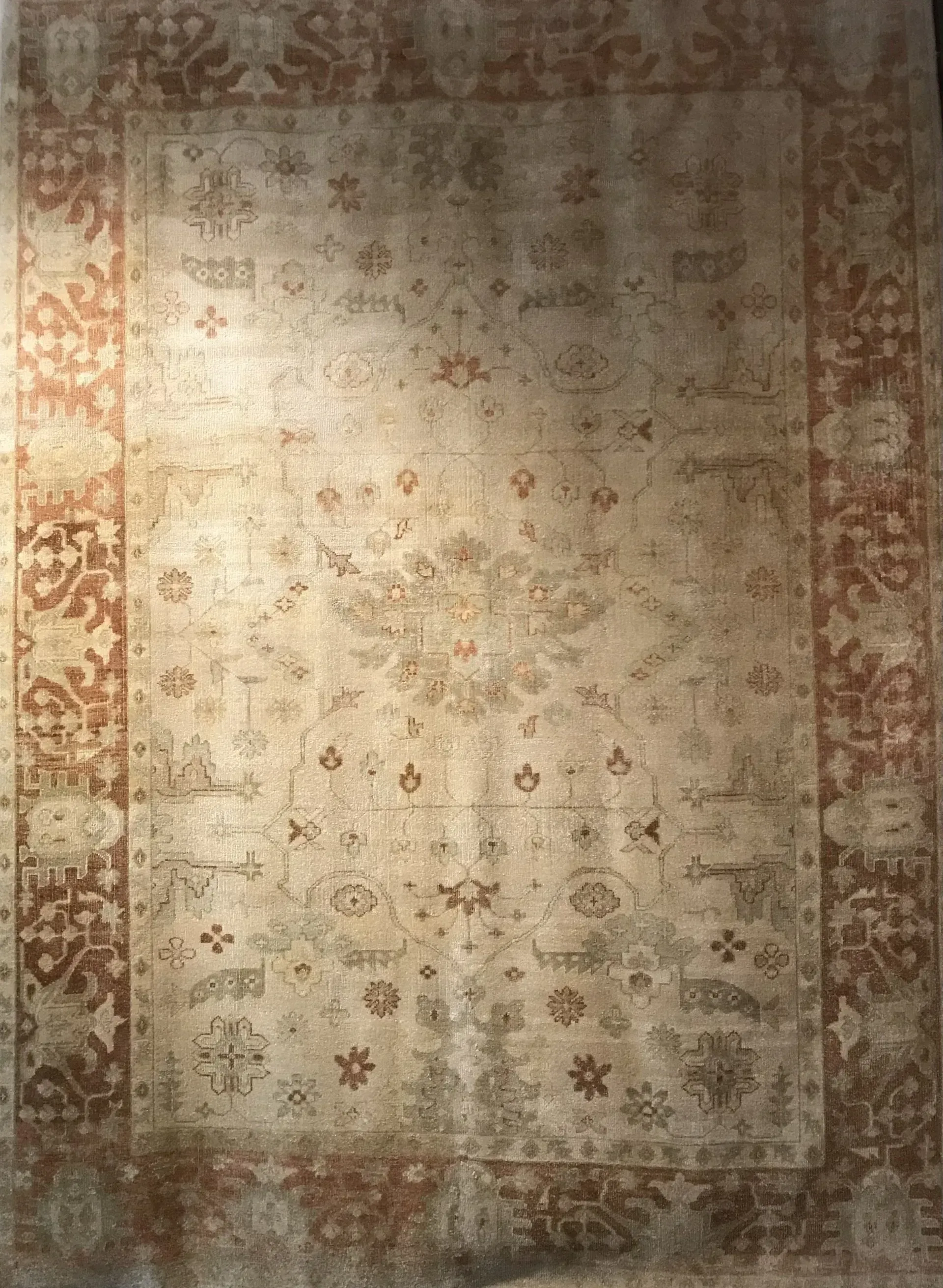 A rug with a detailed pattern on it.