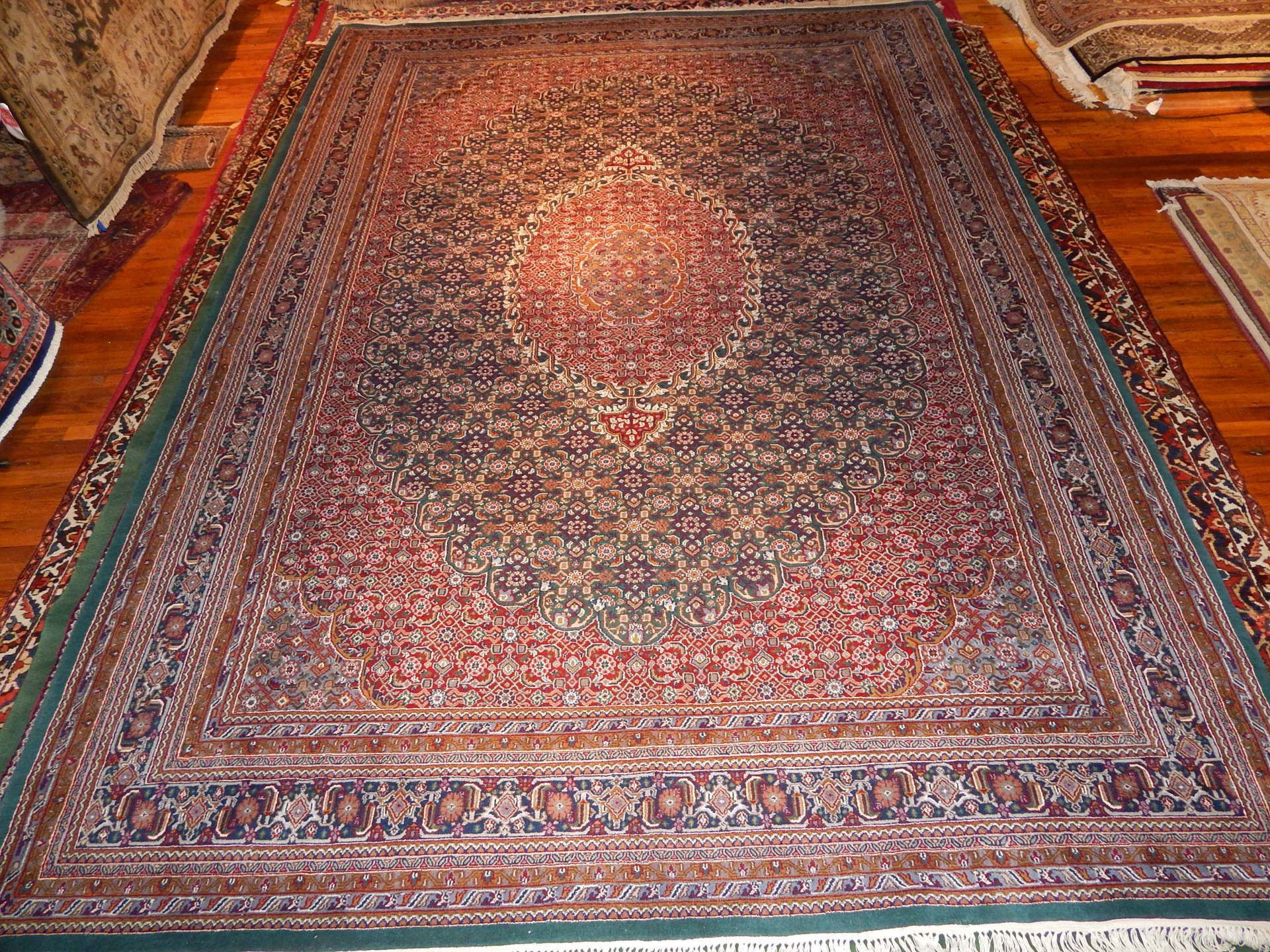 A rug with a detailed pattern on it.