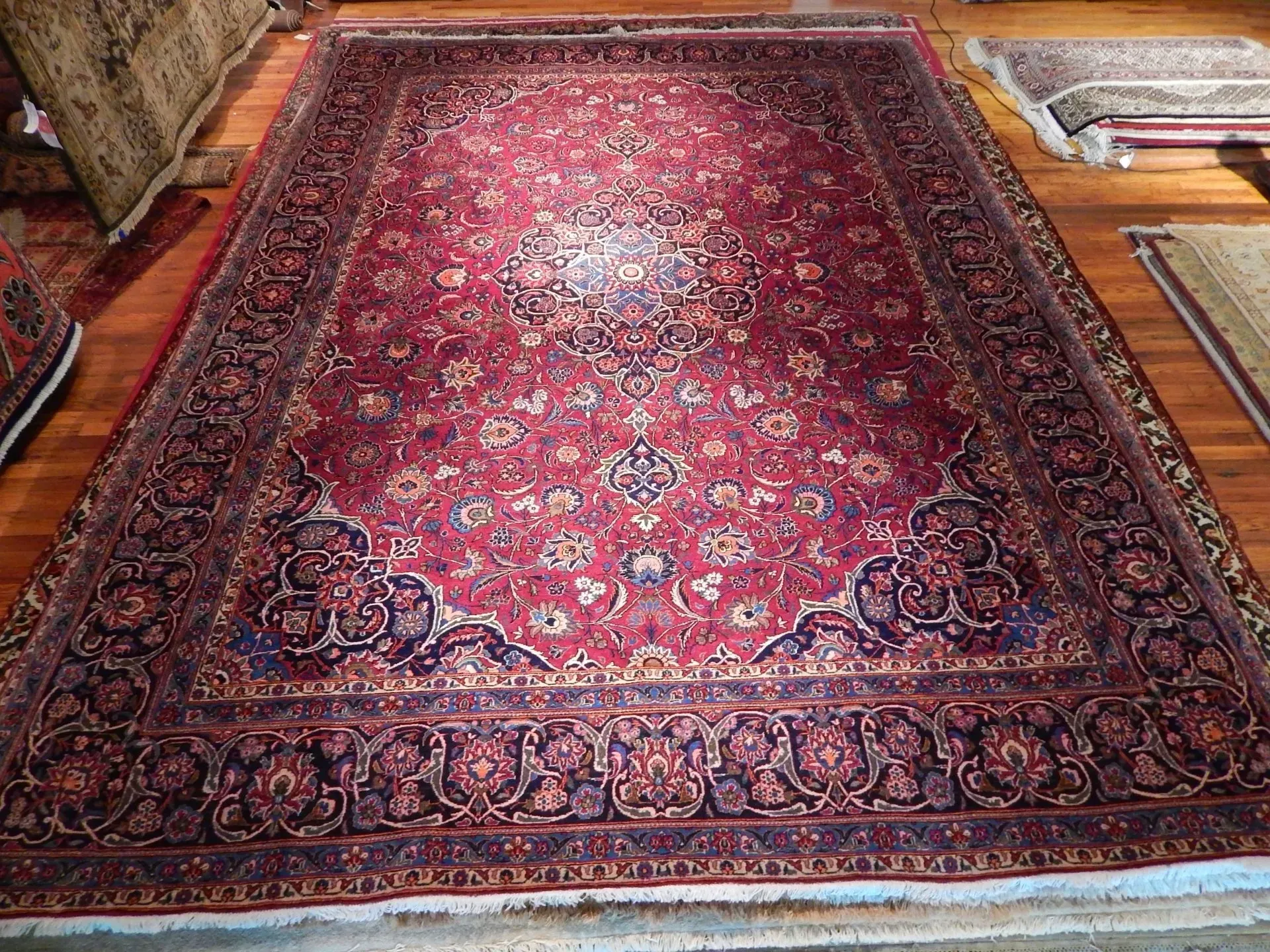 A rug with a detailed pattern on it.