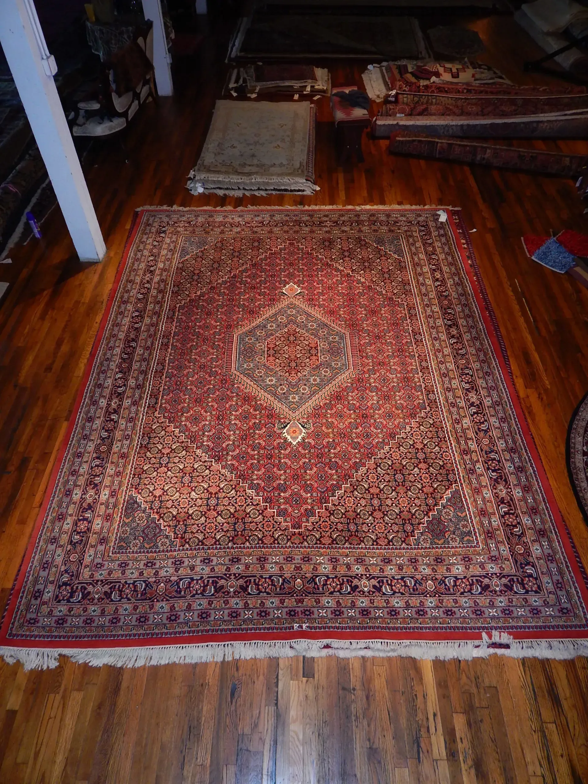 A rug with a detailed pattern on it.