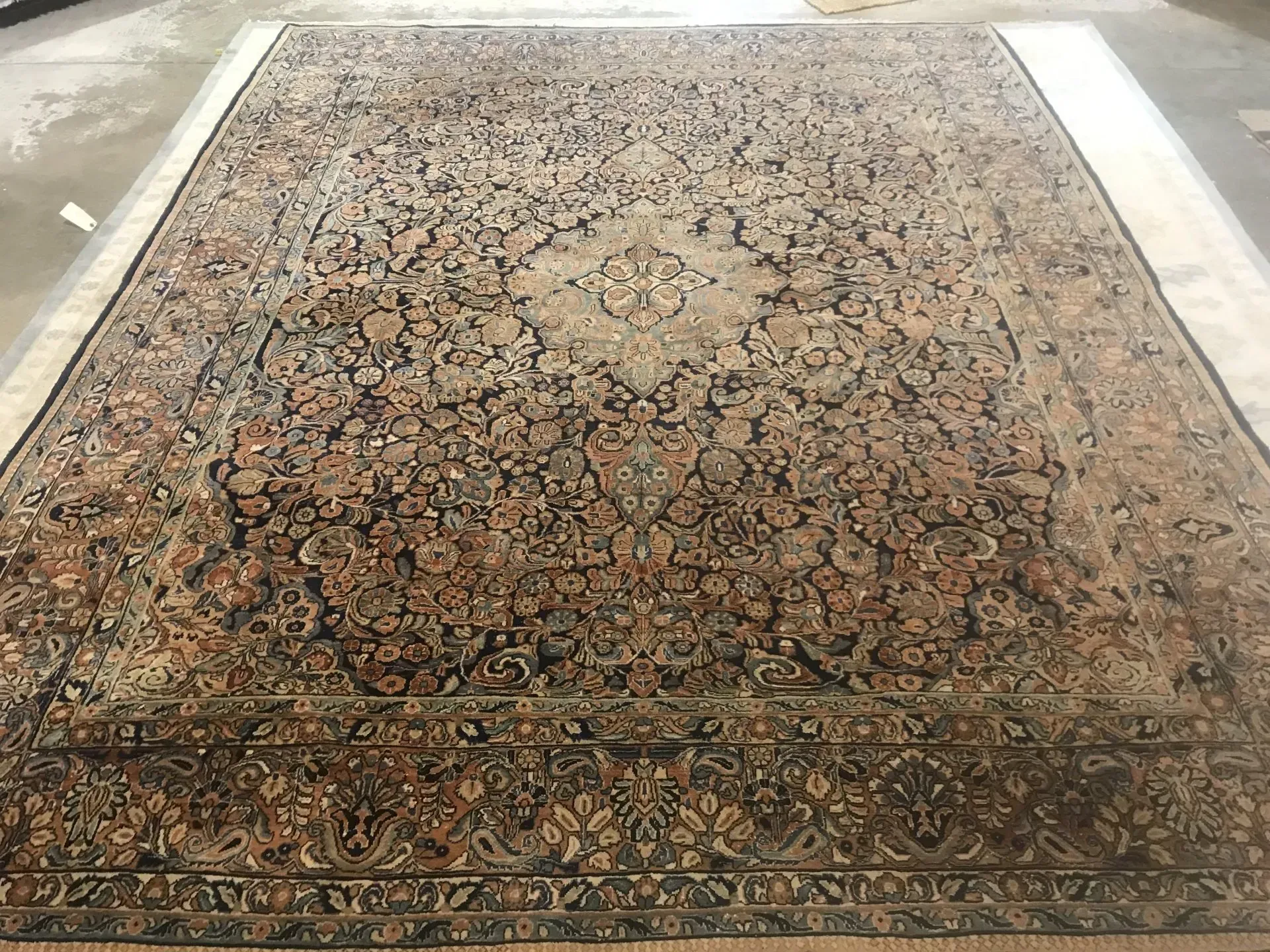 A rug with a detailed pattern on it.