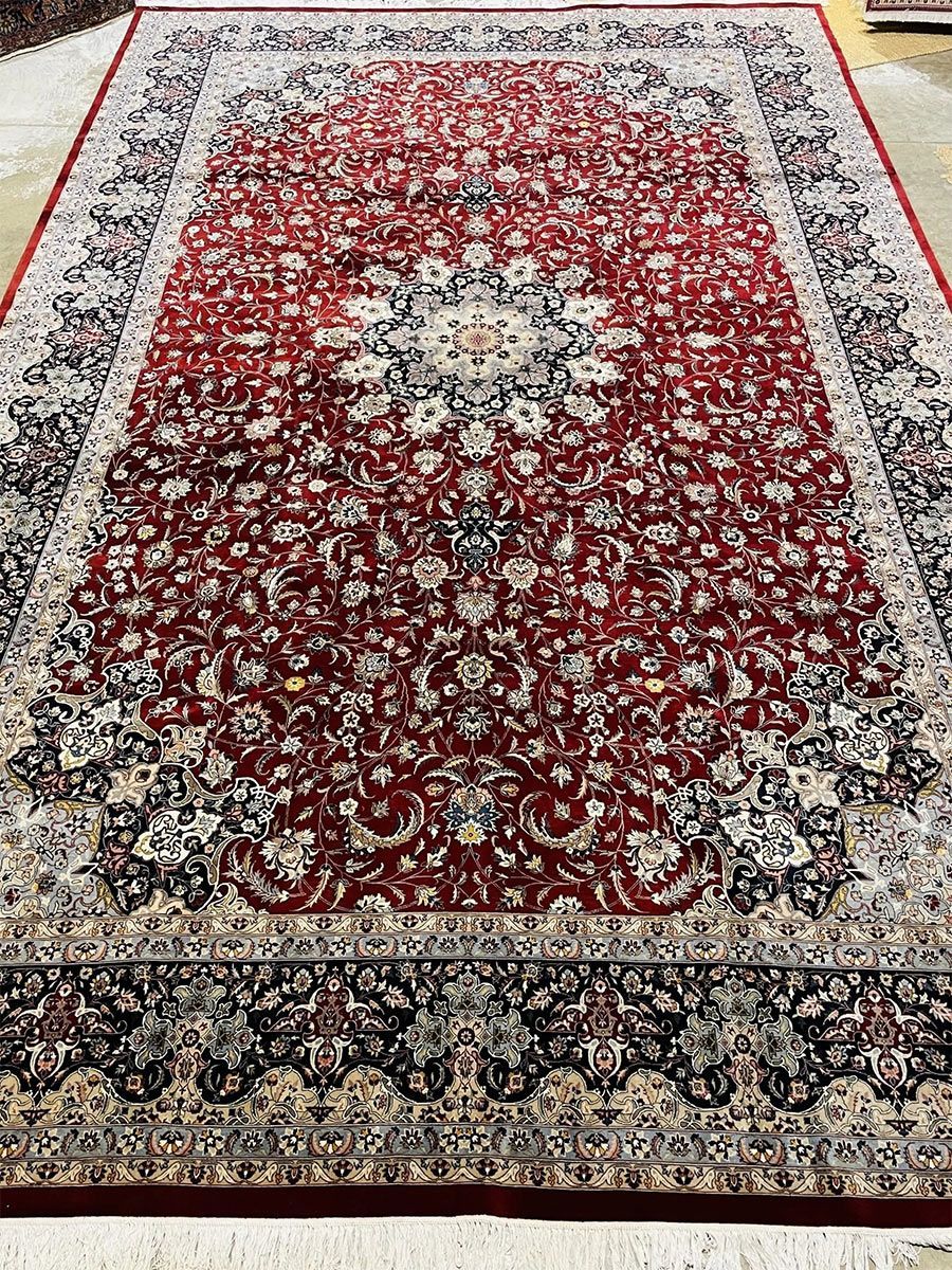 A rug with a detailed pattern on it.