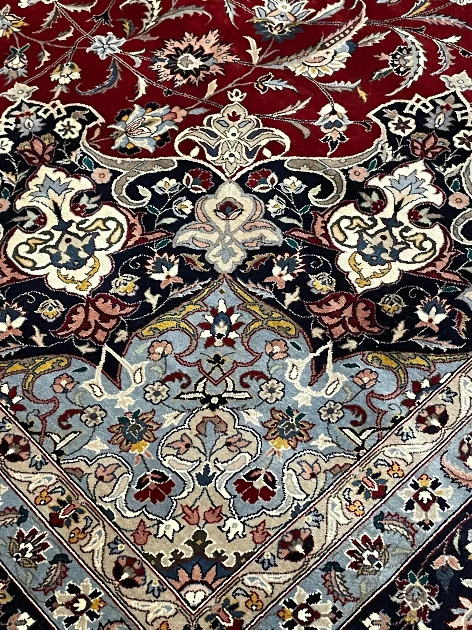 A rug with a detailed pattern on it.