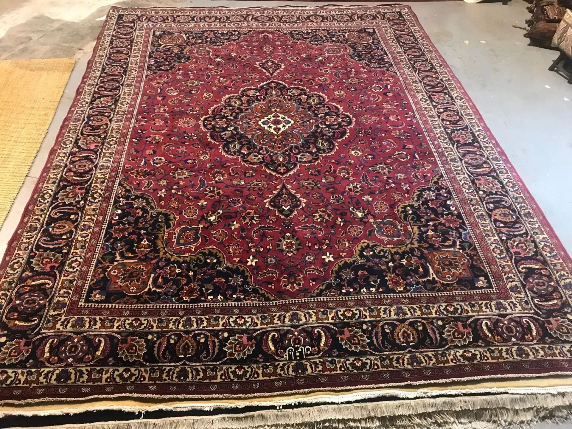 A rug with a detailed pattern on it.