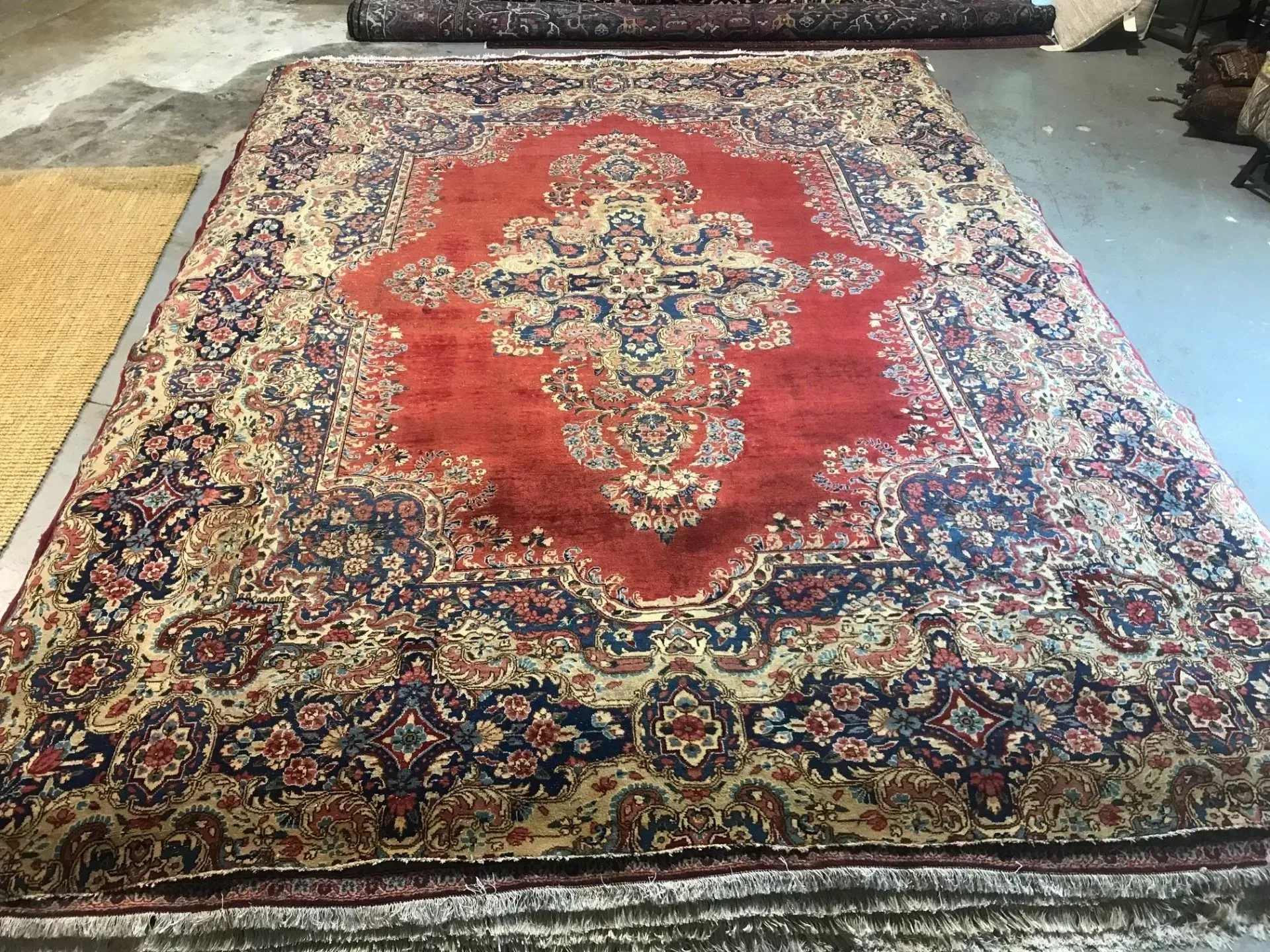 A rug with a detailed pattern on it.