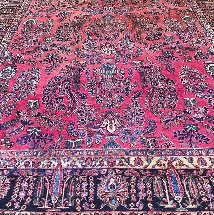 A rug with a detailed pattern on it.