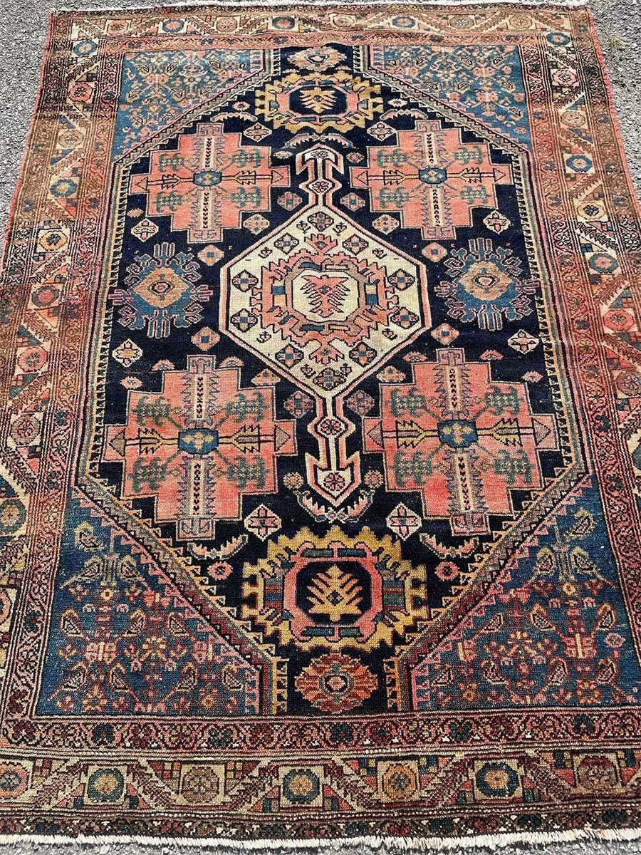 A rug with a detailed pattern on it.