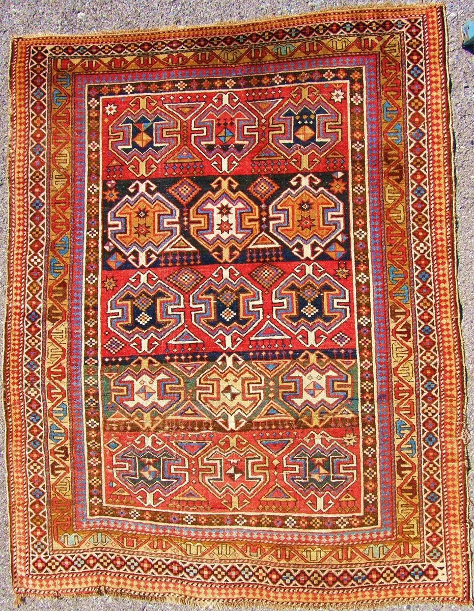 A rug with a detailed pattern on it.