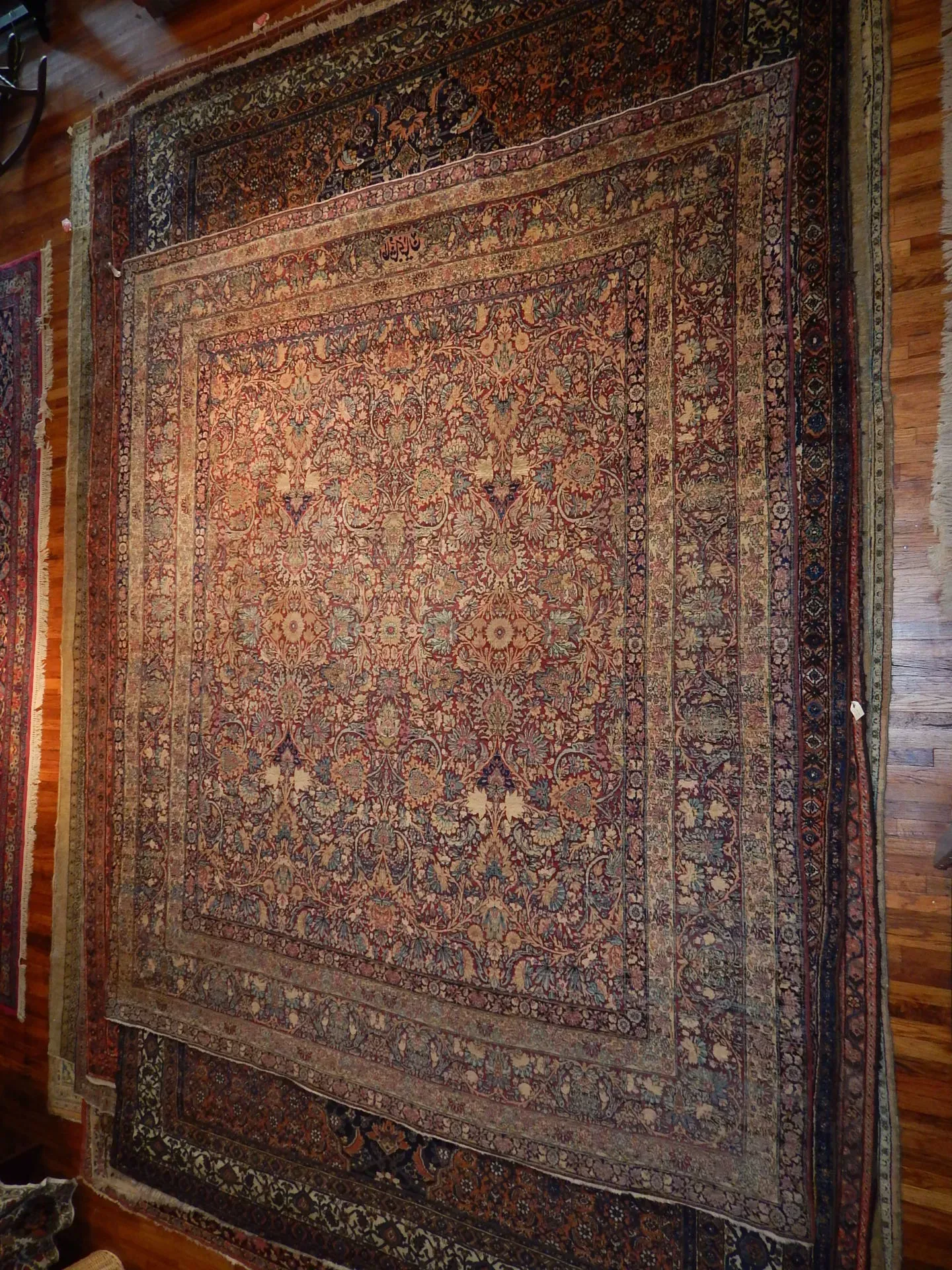 A rug with a detailed pattern on it.
